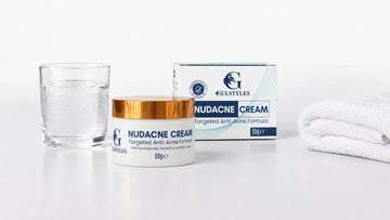 Nudacne cream with a glass of water and a towel in summer light