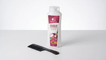 Growlyn onion shampoo beside a black comb with a few short hairs in it